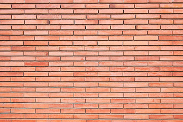 Fototapeta premium Bright red brick wall background texture