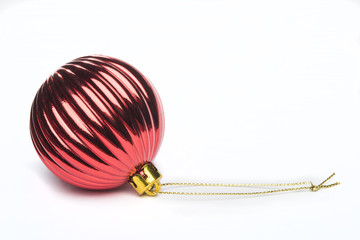 Red Christmas decorations on a white background