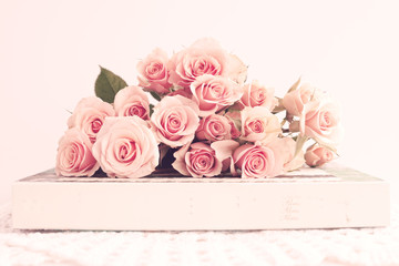 Roses over a vintage box