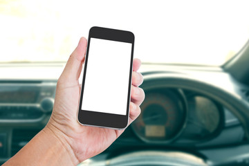 Hand holding blank screen mobile phone with Car inside backgroun