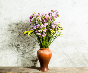 Fototapeta na wymiar flower in vase on table