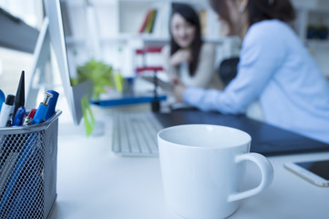 Women have a conversation with the person next to the seat
