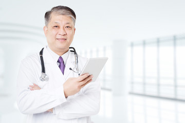 pose and gesture of old Asian man doctor