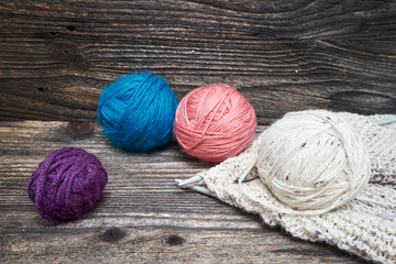 Balls of yarn with knitting needles