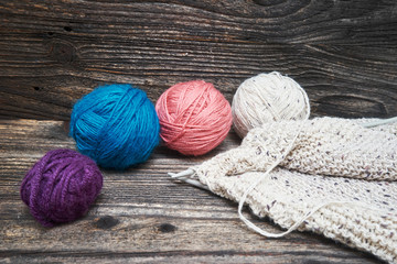 Balls of yarn with knitting needles