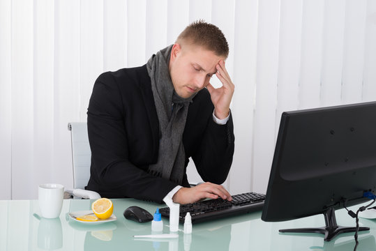 Businessman Suffering From Headache