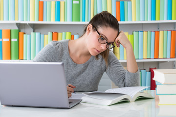 Woman Studying In Library