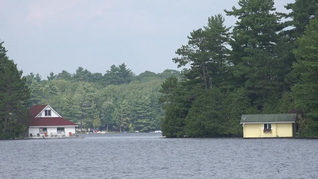 Two boathouses on Lake Muskoka, Ontario
