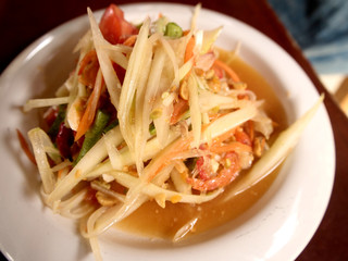 spicy papaya salad on the table