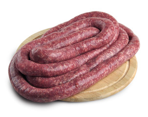 whole Sausage on chopping board
