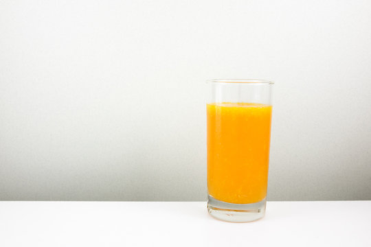 The glass of tasty pure orange juice for a good healthy.