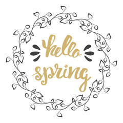 Hello Spring. Hand lettering, calligraphy inscription with spring leaves.