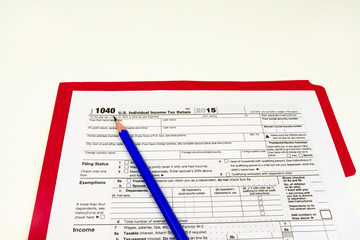 Fototapeta premium Tax Form 1040, Tax Form Details with Light Background