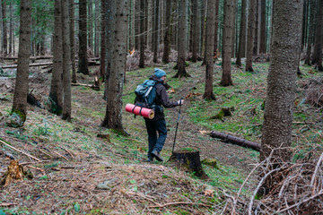 caucasian male hiking in mountains