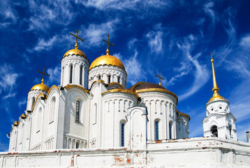 Orthodox cathedral with golden domes under a blue sky