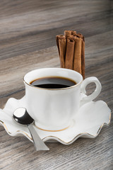 Cup of espresso and cinnamon