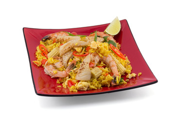 Rice with curry and seafoods isolated on white background.