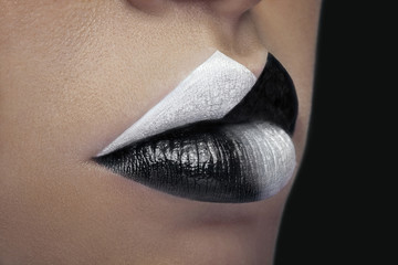 Close up lips in black and white make up