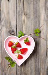 Fresh strawberries in plate.