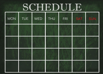 Schedule on chalkboard