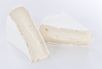 Camembert on grey background