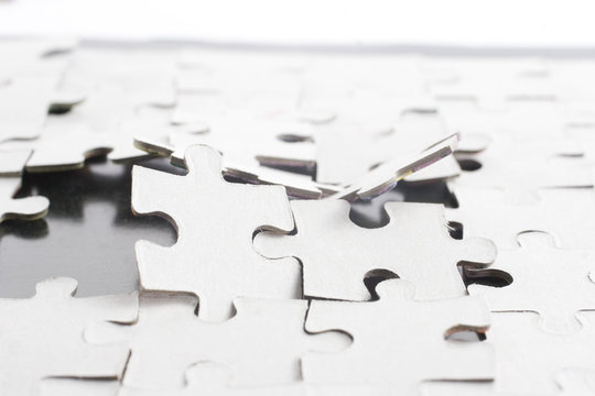 Broken puzzle (with some parts already missing)