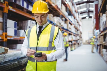 Portrait of smiling warehouse manager