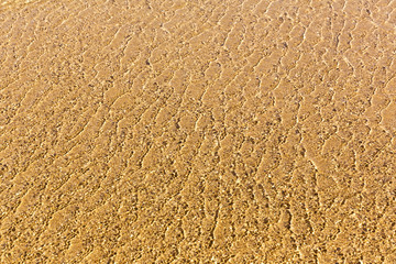 Transparetn water and sand background