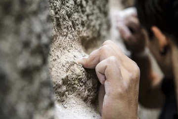 Foto op Aluminium Close up picture of the hand of a climber. © Onigiri