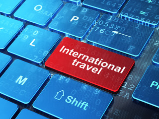 Fototapeta premium Travel concept: International Travel on computer keyboard background