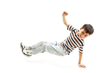 Little cool hip-hop boy in dance. Isolated on white background