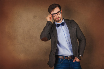 Studio shot of a stylishly dressed young man