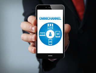 Omnichannel graphic on the screen businessman smartphone