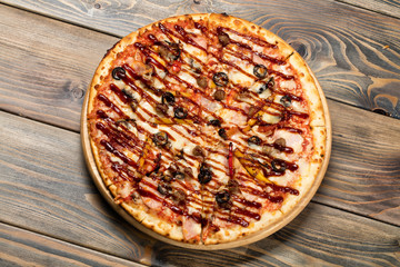 Pizza On An Old Wooden Desk