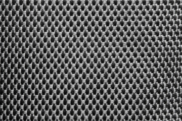 Braided black fabric background.