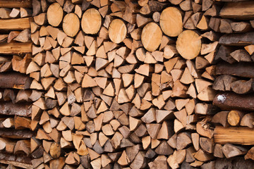 Pile of chopped fire wood prepared for winter