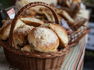 Closeup of fresh breads in basket at bakery

