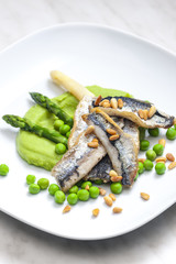 herring with green asparagus and peas