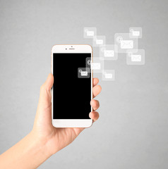 Touch screen smartphone in a hand