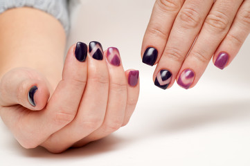 exclusive manicure on short nails in shades of purple