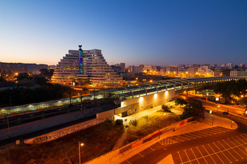 Fototapeta na wymiar Beautiful panorama of Lisbon, Portgual, at nightfall of station Entrecampos-Poente