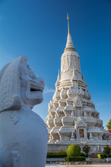 Antique guardian marble lion sculpture in front of the Wat Bench, Thailand
