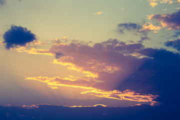 Fototapeta premium Clouds on the sky in sunset time. Toned
