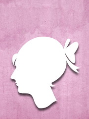 Close-up of a young woman profile silhouette on pink canvas background