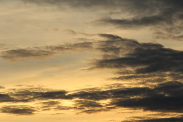 Fototapeta na wymiar Reddish and cloudy sky at sunset in Bregenz, Austria.