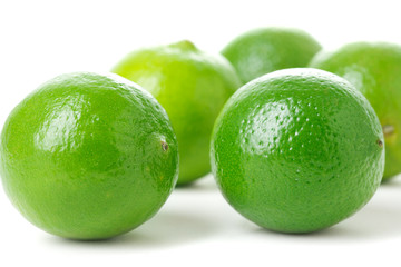 limes on white background