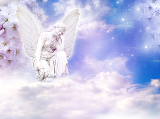 spring angel with flowers and copy space