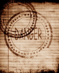 Danger stamp on a grunge background