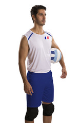 Professional French Volleyball player with ball.