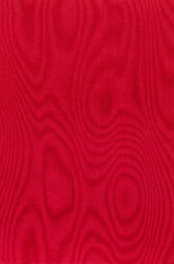 Roter gewebter Stoff mit Moire